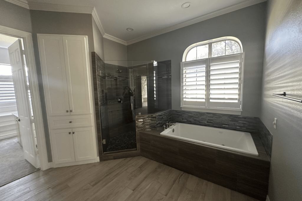 Angled Built-in Tub and Enclosed Shower before remodel