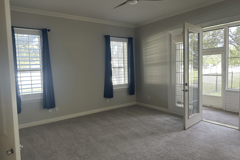 Empty Master Bedroom with Carpet Before Remodel